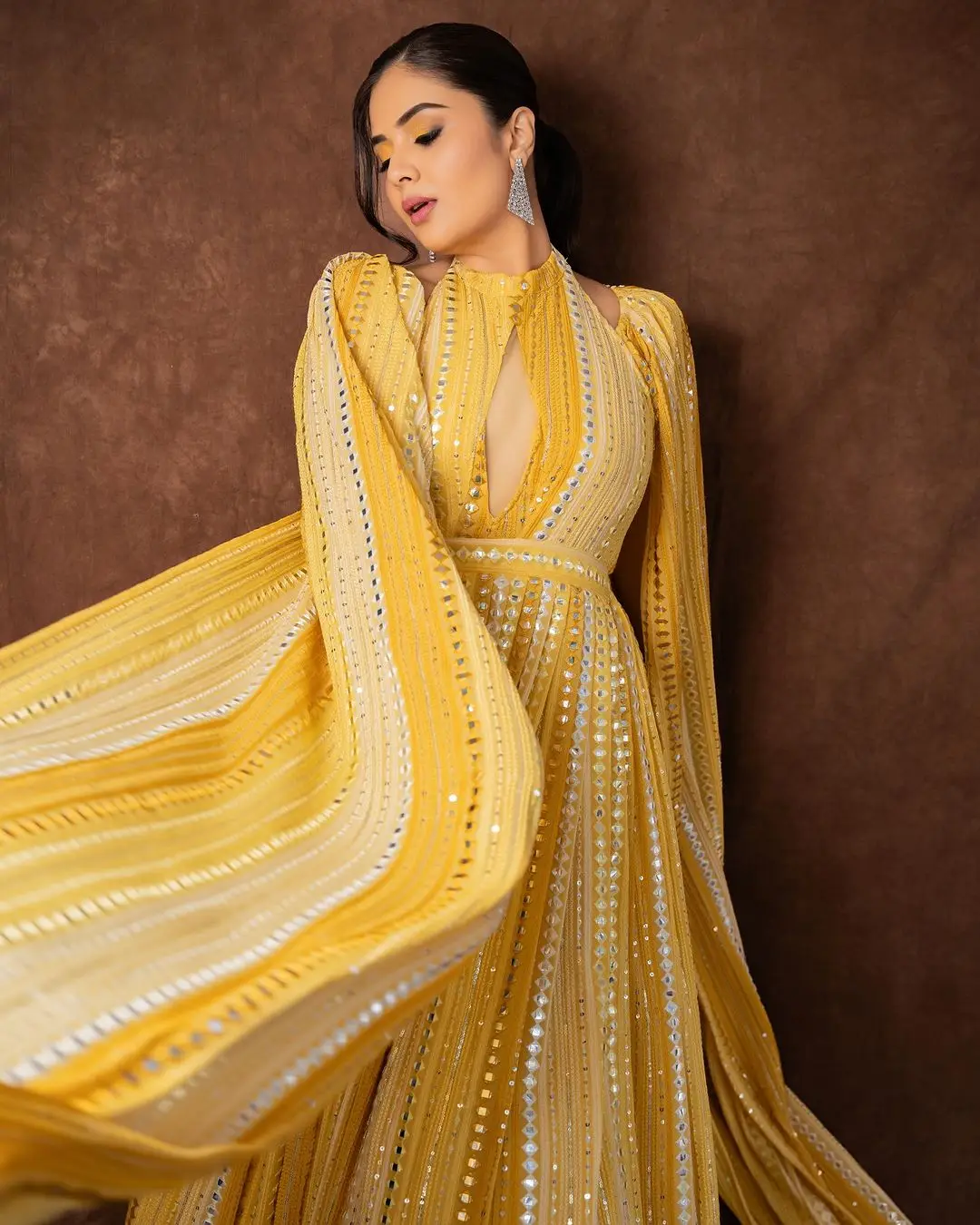 Maa TV Anchor Sreemukhi in Long Yellow Gown